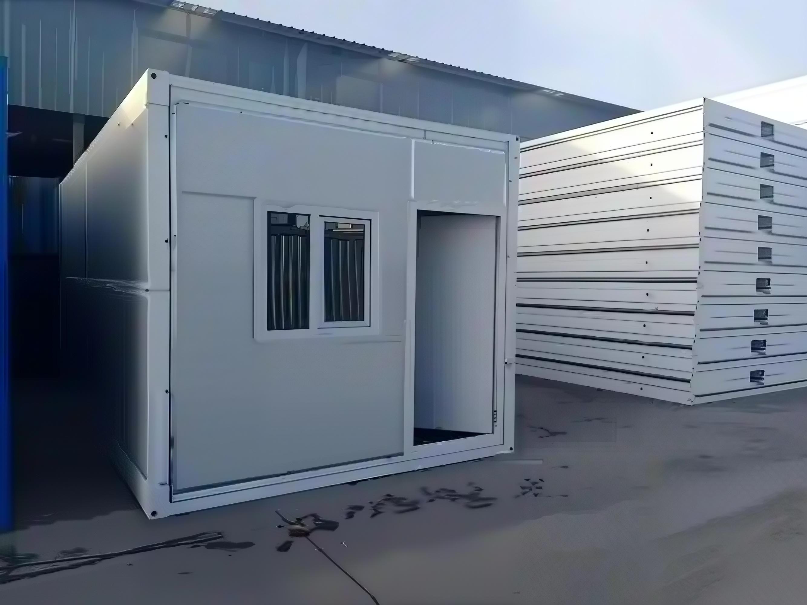 Modular board house product photo - front view with windows and door
